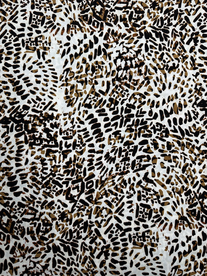 A detailed abstract painting featuring a complex pattern of black and brown irregular shapes and lines on a white background. The design is densely packed, creating a textured and chaotic appearance reminiscent of animal prints or organic patterns, similar to the intricate designs seen on Printed Lycra - Tanner - 150cm by Super Cheap Fabrics.