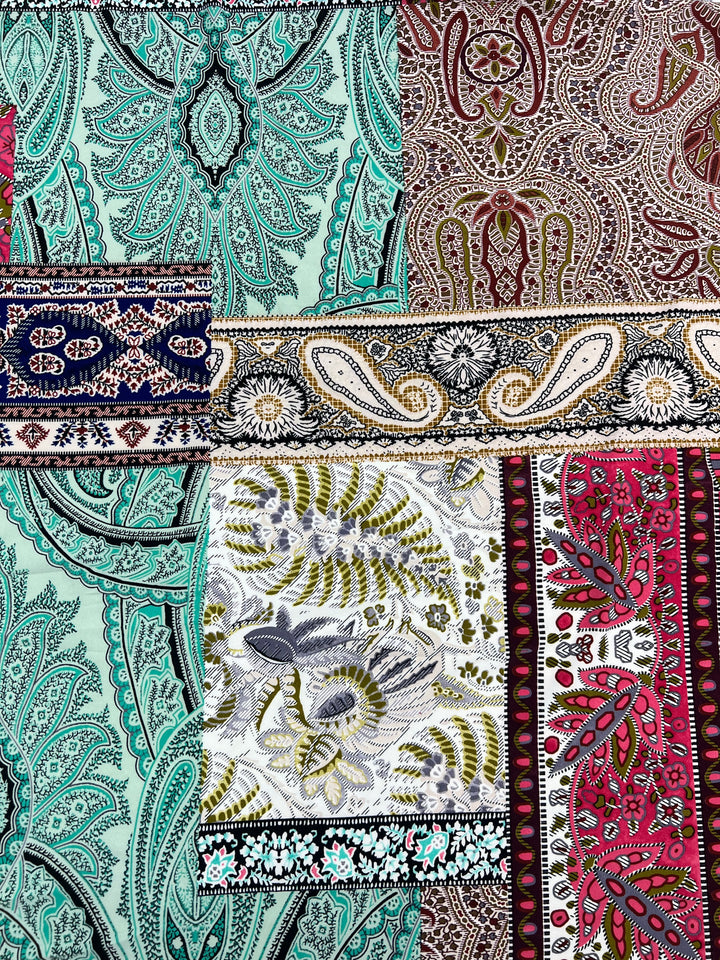 A colorful patchwork medium weight fabric with intricate paisley designs in shades of teal, brown, red, and green. The various patches include detailed floral patterns and ornamental motifs, creating an elaborate and vibrant mosaic. This fabric is the Printed Lycra - Paisley Patch - 150cm from Super Cheap Fabrics.