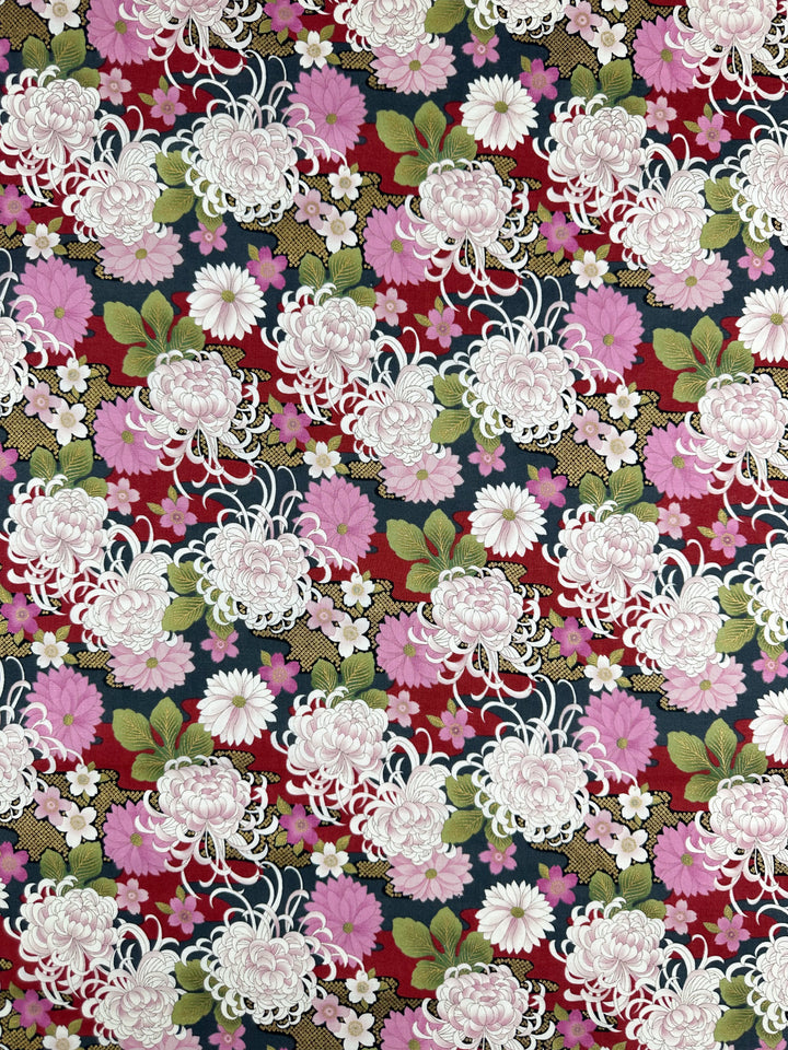 Super Cheap Fabrics' Japanese Printed Cotton - Chrysanthemum (112cm) features a red and black background with white, pink, and purple flowers plus green leaves in an intricate design inspired by traditional Japanese textile art.
