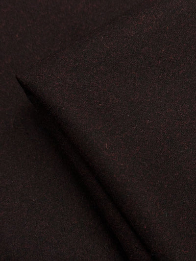 A close-up of Super Cheap Fabrics' Melton Wool - Valentine Marle (152cm), showcasing its dark brown, soft texture with subtle surface fibers—perfect for stylish outerwear.