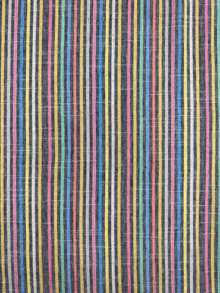 The Linen Blend - Beachside from Super Cheap Fabrics features a vintage look with vertical stripes in pink, yellow, blue, green, and black. This medium-weight fabric's repetitive pattern and texture resemble woven linen. Width: 143cm.