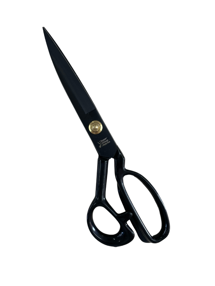 A pair of black metal Tailor Scissors - Dressmaking Shears crafted from durable manganese steel, featuring a sleek design with a gold pivot point for the blades. The scissors have a sharp, pointed tip and large ergonomic handles, suitable for both professional and household use. The background is plain white.